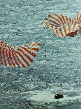 A photo of Apollo 14 command module splahes down into the South Pacific ocean