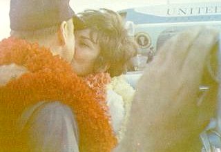 A photo of astronaut,Lovell, greeting wife