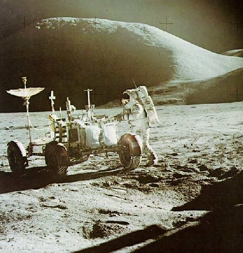 A photo of Apollo 15 astronaut Irwin setting up the Lunar Roving Vehicle