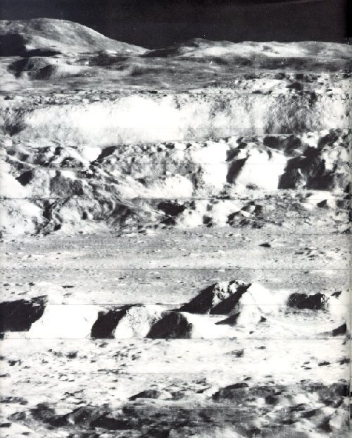 A photo of the landscape of the Moon with rolling mountains