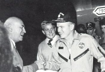 A photo of Robert Gilruth greeting Apollo 8 astronaut,Frank Borman