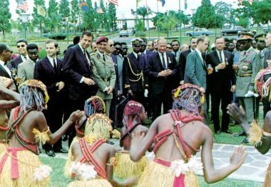 A photo of children of Kinshasa performing for astronauts