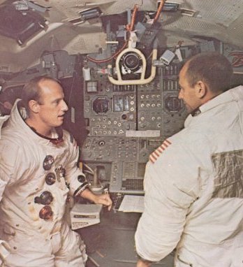 A photo of astronauts,Conrad and Bean in the LM simulator