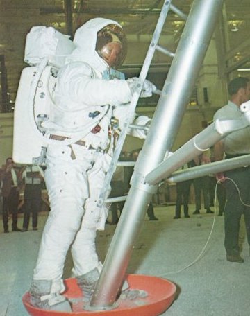 A photo of astronaut,Armstrong,is about to climb up a ladder
