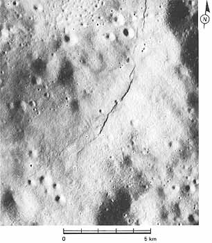 Figure 87 crenulate lobate scarp occurs within a small depression on the far side