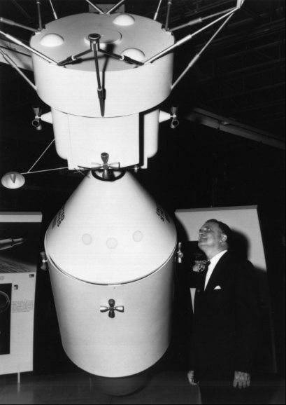 NASA Administrator examining model